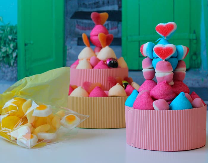 Tartas de chuches y nubes en tonos rosas y azules